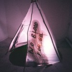 Red Breath tipi graffiti - live artwork by contemporary First Nations artist Jude Norris