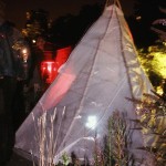 Tender Trading Tipi back and landscape - contemporary Native American performance art by Jude Norris
